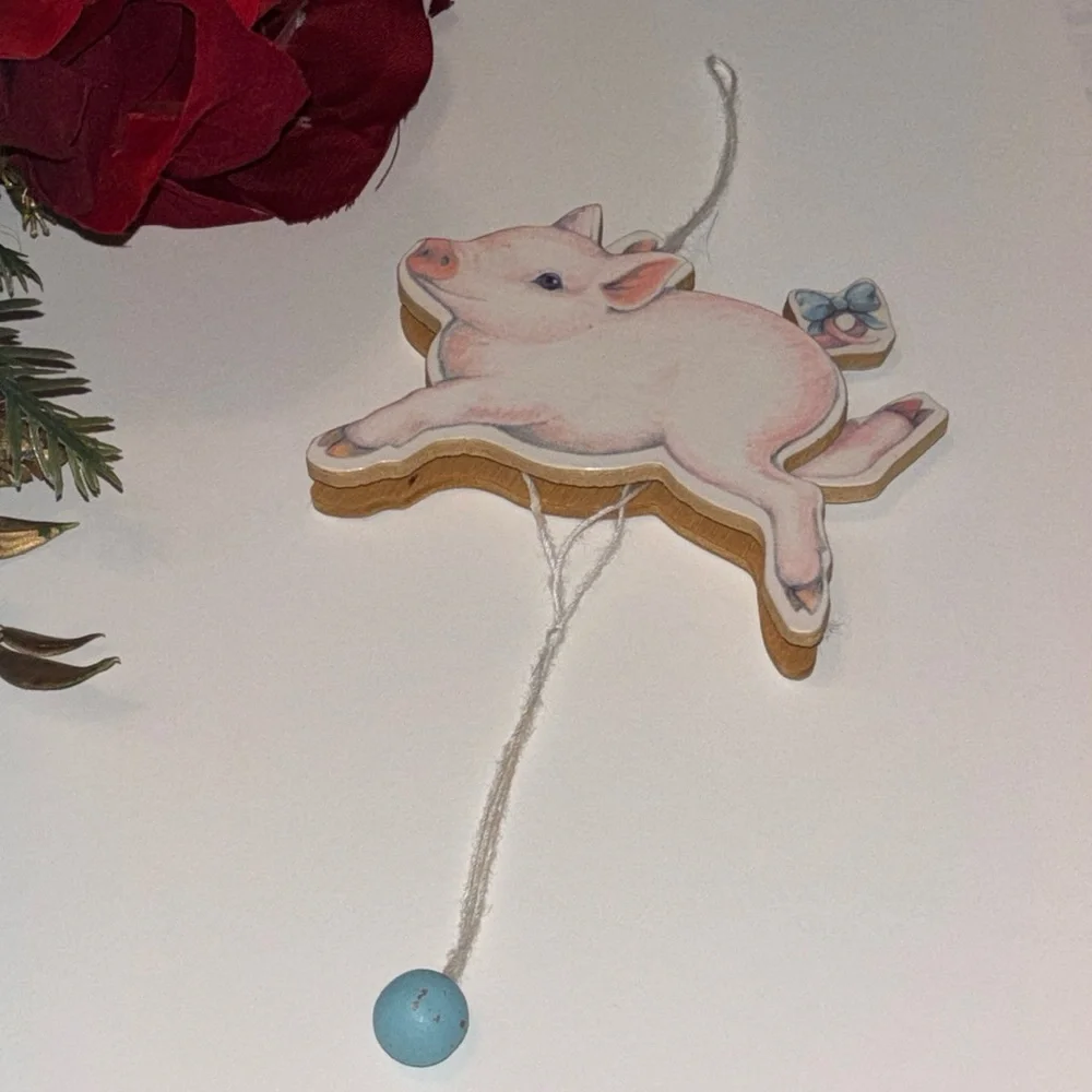 Flying Pig ornament Midwest Importers Canon Falls Wooden Pull String Toy